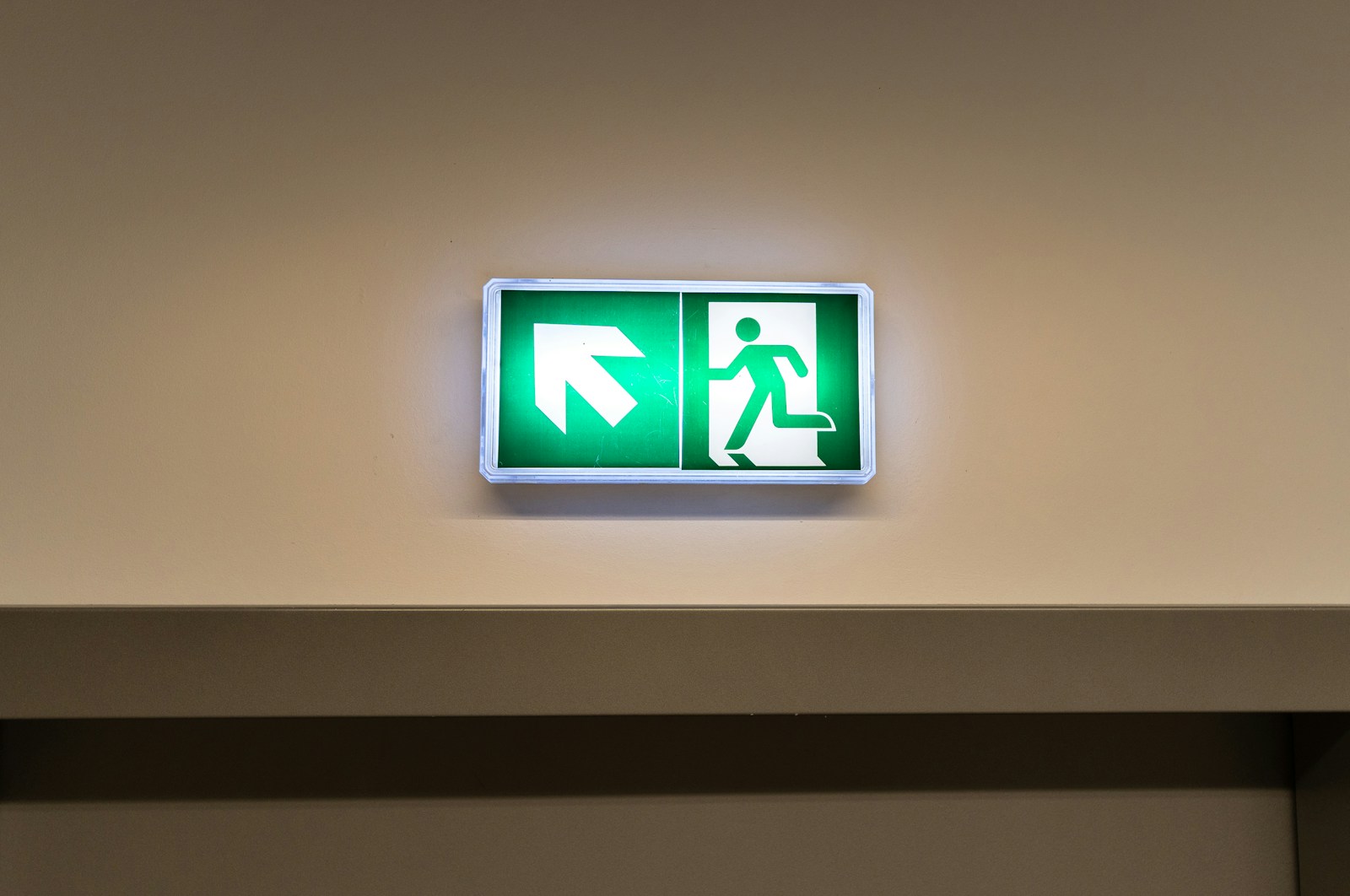 Emergency exit sign shows the way out.