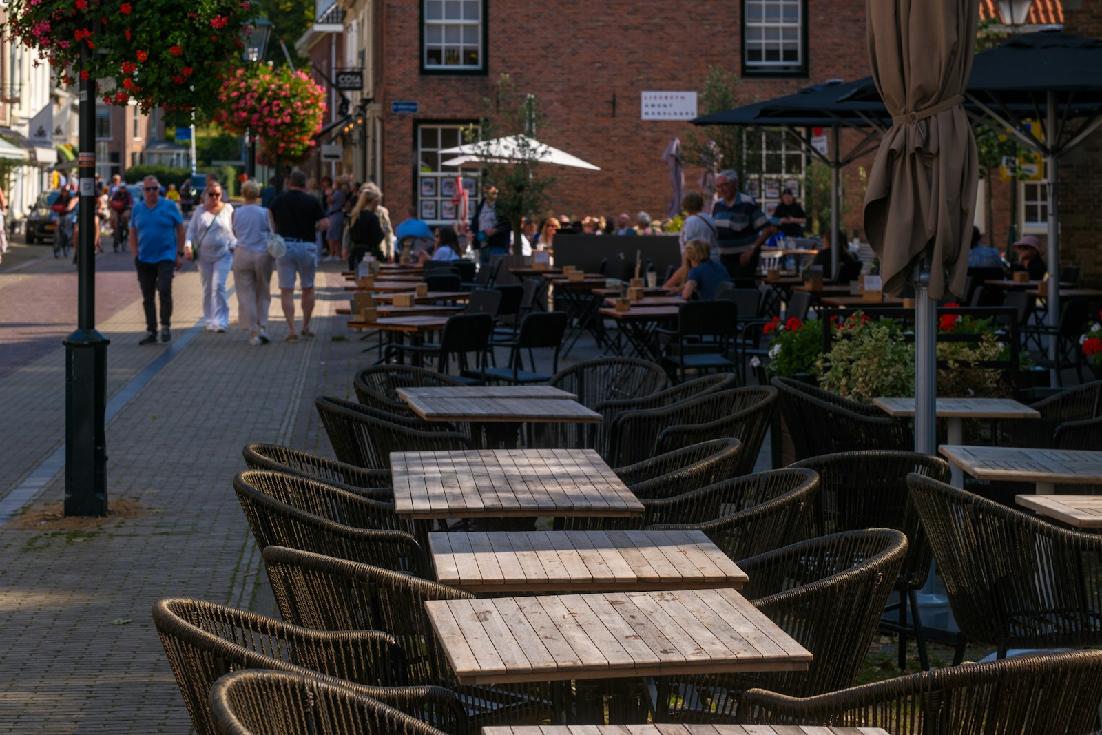 A row of tables sitting on the side of a street