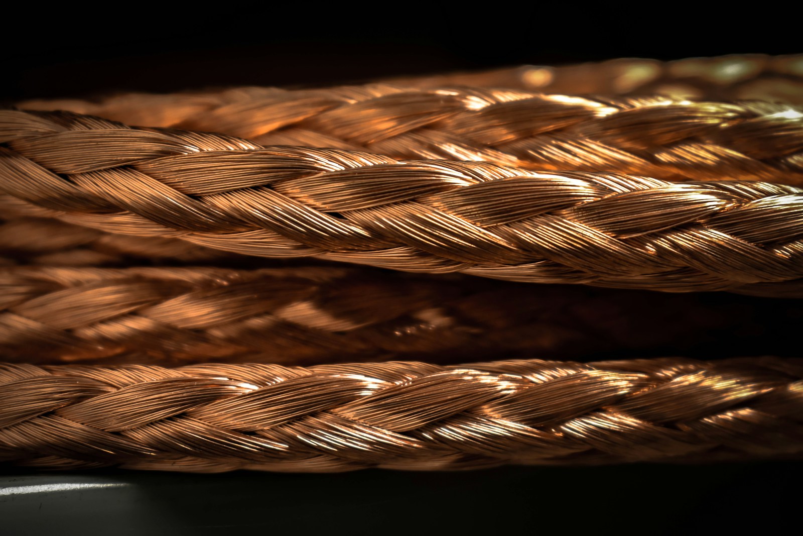a close up of a rope on a black background